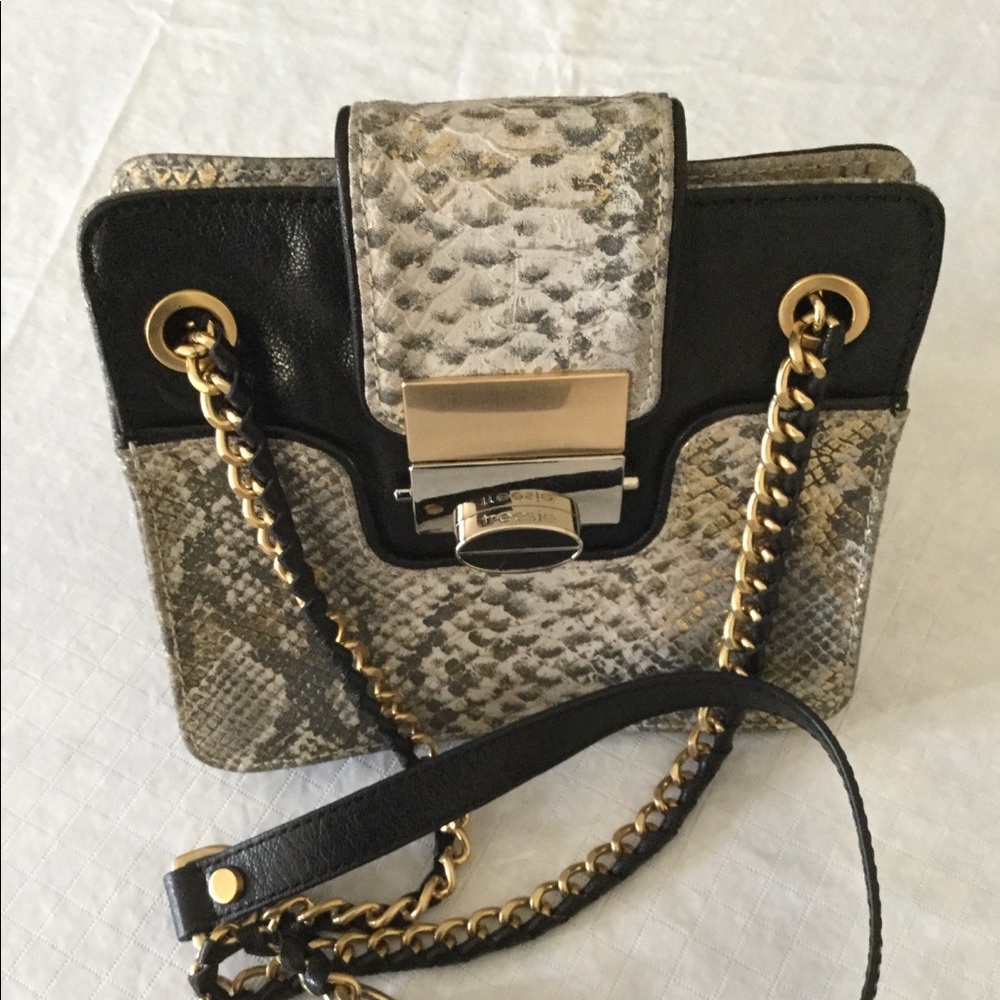 EUC Treesje Leather metallic snake cross body bag.
